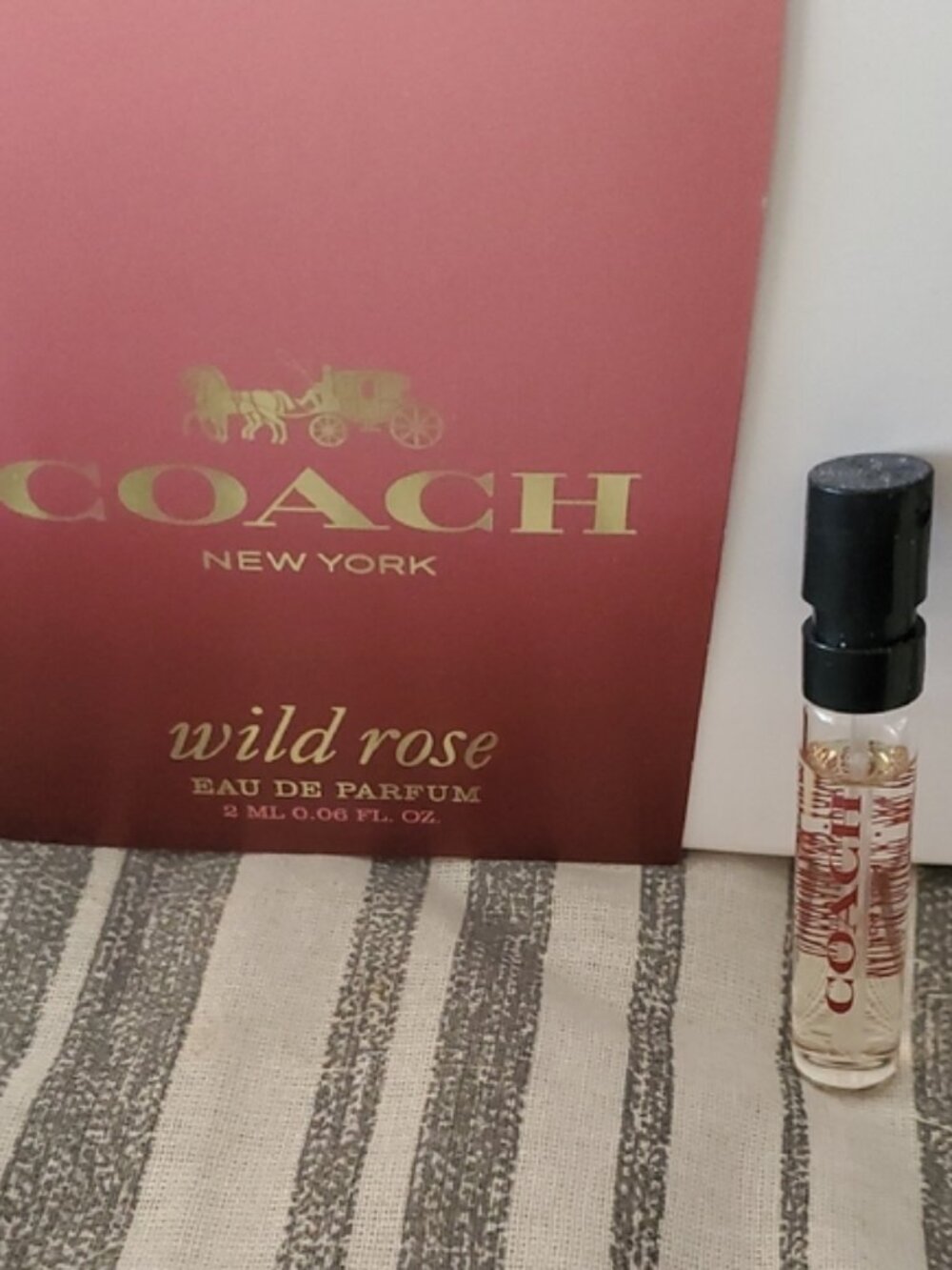 Coach Wild Rose
